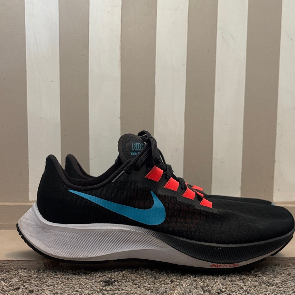 Nike Black Sneakers with Blue and Red Accents